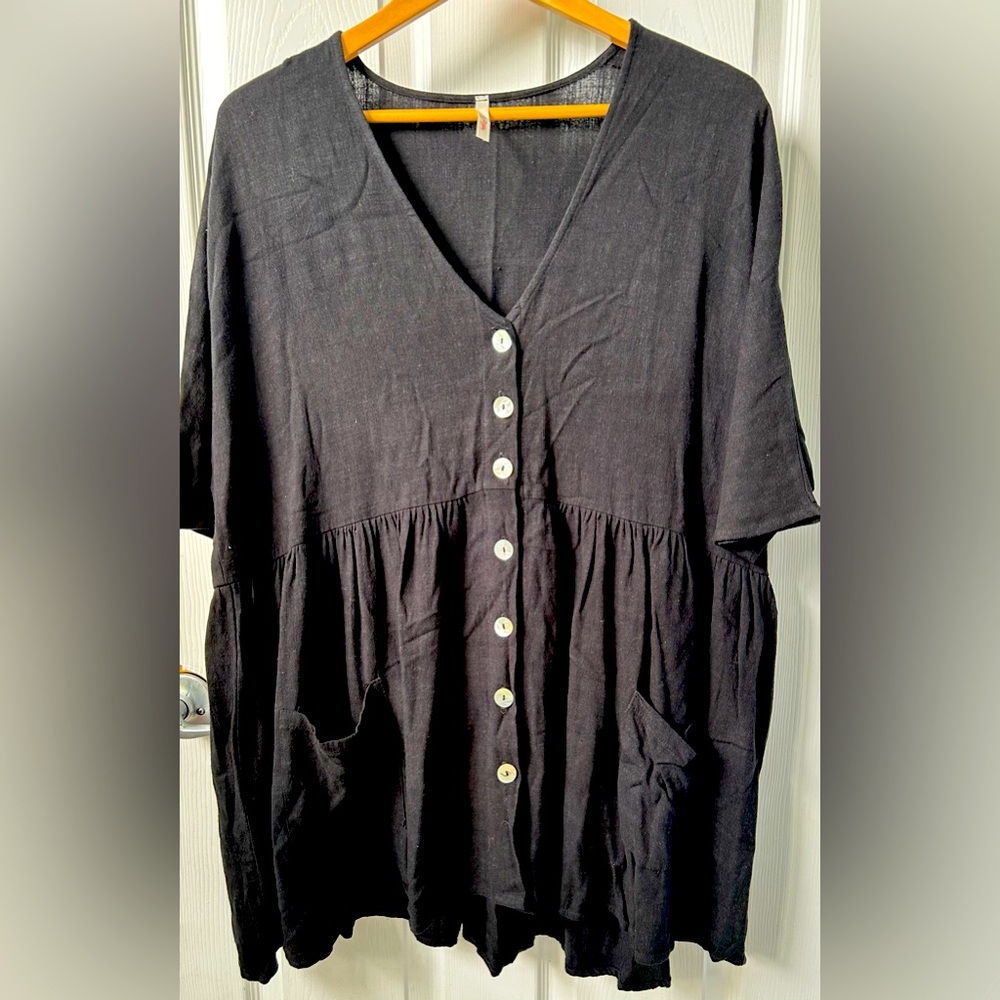 Black babydoll  tunic, dress says medium but body of dress fits oversized.
